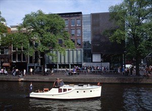 HOLLAND, Noord, Amsterdam, Anne Frank Museum seen over a canal