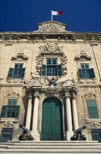 MALTA, Valletta, Auberge de Castille et Leon. Decorative baroque facade with steps leading to green