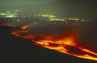 ITALY, Sicily, Night-time view of Volcano erupting. Lava flow from the Monti Calcarazzi fissure.