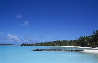 PACIFIC ISLANDS, Cook Islands, Aitutaki, Sandy bay with old flying boat jetty