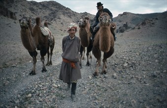 MONGOLIA, Gobi Desert, Herdsmen and camels