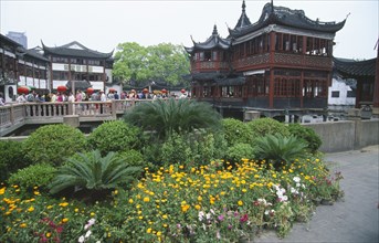 CHINA, Shanghai, Wuxingting Teahouse set in pond at the Mandarin Gardens Bazaar or Yuyuan with