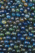 JAPAN, Honshu, Tokyo, Iridescent marbles close up detail