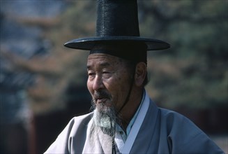 SOUTH KOREA, Seoul, "Elderly male follower of Confucius wearing traditional dress at ceremony,