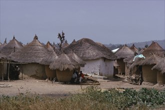 NIGERIA, Uke, Circular thatched mud huts in the village between Abuja and Keffi