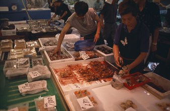 JAPAN, Honshu, Tokyo, Tsukiji Fish Market with displays of various seafood