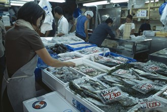 JAPAN, Honshu, Tokyo, Tsukiji Fish Market with displays of various fish on ice