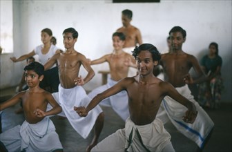 INDIA, Kerala, Dance, Men and boys training to be Kathakali dancers