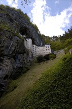 SLOVENIA, Predjama Castle, 16th Century castle built half way up 123M high cliff