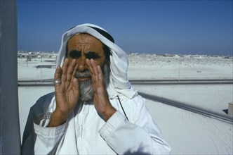 UAE, Abu Dhabi, Call to prayer by muezzin.