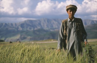 AFGHANISTAN, Badakhshan, People, Young farmer of Tajik descent.