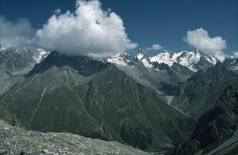 RUSSIA, Central Caucasus, Mount Ullutau, Cloud over mountain peak and the Adyrsu Valley