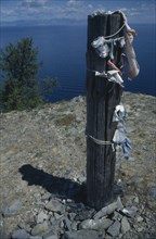 RUSSIA, Siberia, Lake Baikal, Buryat shaman tethering post or serge representing the tree of life.