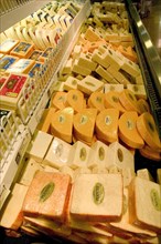 USA, Minnesota, St Paul, Display of cheese at the Mississippi Market a natural foods co-op located