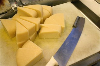 USA, Minnesota, St Paul, "Wedges of freshly cut Park brand Parmesan Cheese from Wisconsin at the