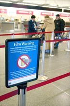 USA, Minnesota, Minneapolis, Northwest Airlines security ticket screener at Minneapolis-St. Paul