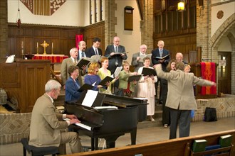 USA, Minnesota, Minneapolis , Choir singing at Grace University Lutheran Church