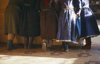 MONGOLIA, People, Cropped view of group of women standing at counter of shop.