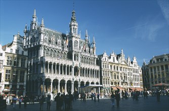 BELGIUM, Brussels, Grand Place lined with cafes with crowds of people.