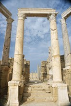 LIBYA, Tripolitania, Leptis Magna, Ruins of Roman city founded in 6th Century BC.  Carved columns