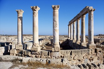 LIBYA, Tripolitania, Sabratha, Roman Forum.  Standing columns and ruined walls and streets.