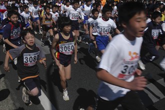 JAPAN, Chiba, Chiba, 11 and 12 year old boys at the start of 2 kilometer race on Chiba Prefectural