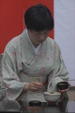 JAPAN, Chiba, Yokaichiba, "Licensed tea master, Chiharu Koshikawa, prepares green tea, ""macha"" at