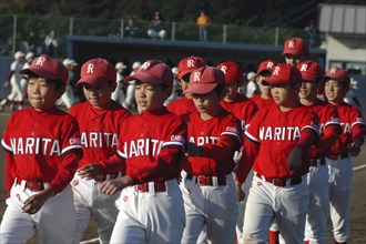 JAPAN, Chiba, Tako, A little league team from Narita parades as part of a tournament opening