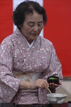 JAPAN, Chiba, Yokaichiba, "Licensed tea master Shikako Namba prepares green tea ""macha"" at a tea