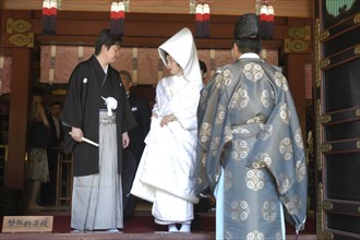 JAPAN, Honshu, Tokyo, "Nezu. Newlyweds after conclusion of Shinto ceremony at Nezu Jinja, both in