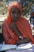SOMALILAND, Hargeisa, Young girl attending Koranic school.