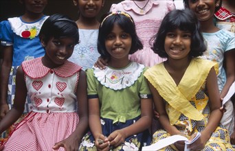 SRI LANKA, Colombo, Group of smiling orphan girls