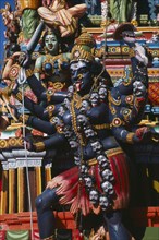 SRI LANKA, Colombo, Ganesh Kovil. Close up detail of colourful Hindu temple carvings