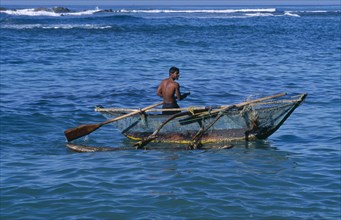 SRI LANKA, Mirissa, Fishing boat at sea
