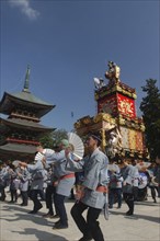 JAPAN, Chiba, Narita , Gion Matsuri. Members dance in front of Narita san Temple before pulling