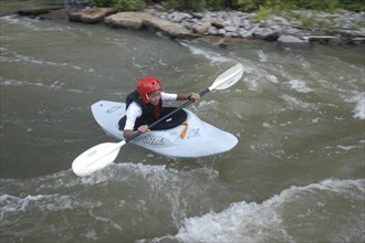 USA, New York, Rochester, "12 year old Japanese student Satoshi Ui, rides white water during a