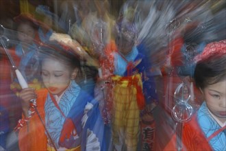 JAPAN, Chiba, Narita, Girls aged 8-12 years old in traditional Edo-era costumes lead their