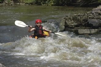 USA, New York, Rochester , 11 year old Becky Taylor in kayak class of Genessee Waterways Center at