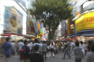 JAPAN, Honshu, Tokyo, Shinjuku. Entertainment district Kabukicho on Saturday evening.  Radial Blur.