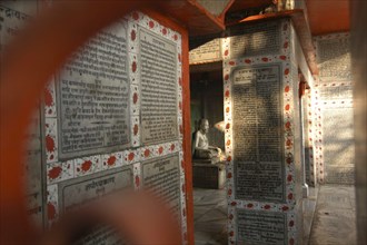 INDIA, Uttar Pradesh, Varanasi , "Hindu verse cover the floor, walls and ceiling of a Hindu saints