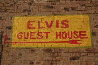 INDIA, Uttar Pradesh, Varanasi , Sign for the Elvis Guest House