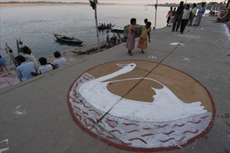 INDIA, Uttar Pradesh, Varanasi , Deep Diwali Festival. Symbol of Goddess Saraswati painted on the
