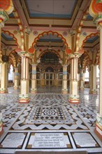INDIA, Uttar Pradesh, Varanasi , Ram Sawmi Temple entrance with colourful columns