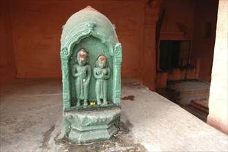 INDIA, Uttar Pradesh, Varanasi , Carved image of Shiva and Parbati at Ghai Ghat