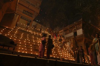 INDIA, Uttar Pradesh, Varanasi, Deep Diwali Festival. View looking up steps leading down to the