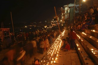INDIA, Uttar Pradesh, Varanasi, Deep Devali Festival on the ghats lining the Ganges River with