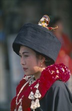 THAILAND, Chiang Mai Province, Portrait of a Iu Mien woman in traditional attire