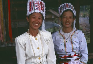 THAILAND, Chiang Mai Province, Samathi Mai, Portrait of two Rawang women at Manou ceremony
