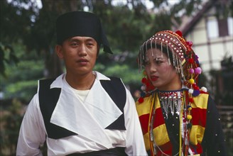 MYANMAR, Kachin State, Manhkring, Lisu man and woman in traditional Lisu attire of the Myitkyina