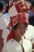 THAILAND, Chiang Mai Province, Mae Jaem, Portrait of a Sgaw Karen girl in traditional umarried